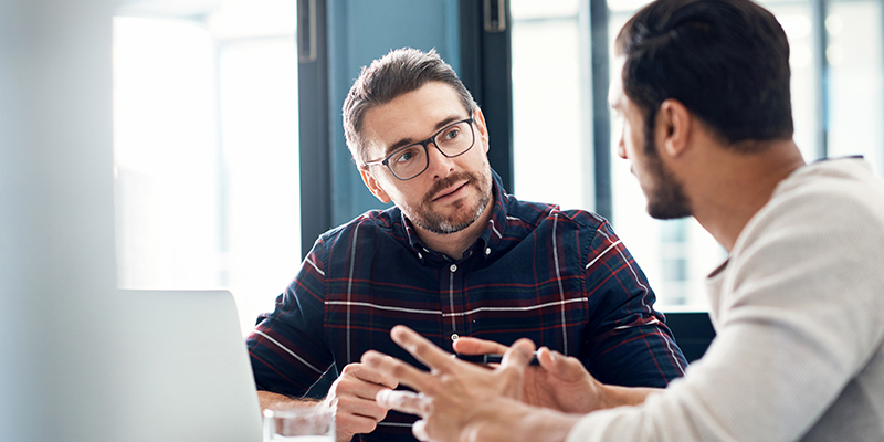 business peers talking business